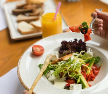 vegetable salad on white ceramic plate